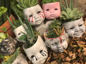 Creepy Baby Head Succulent Planters.jpg